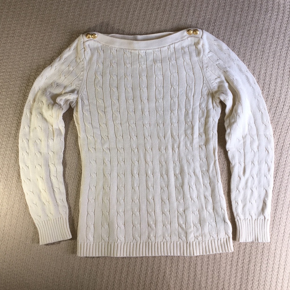 Ivory sweater with gold buttons at shoulders
